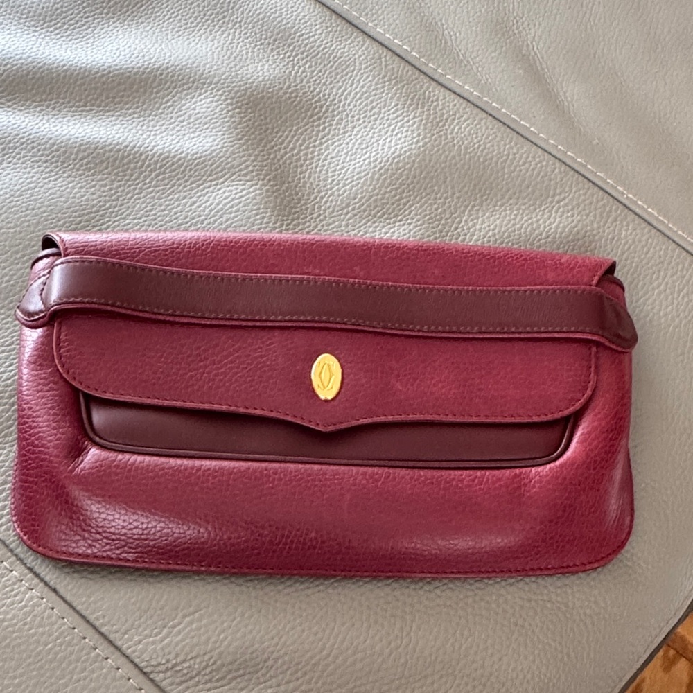 Elegant Burgundy Cartier Leather Clutch